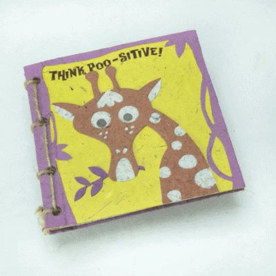 Image of a poo paper journal with a giraffe on it saying think poo-sitive